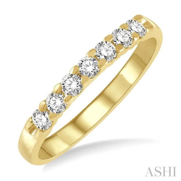 1/3 ctw 7Stones Round Cut Diamond Wedding Band in 14K Yellow Gold