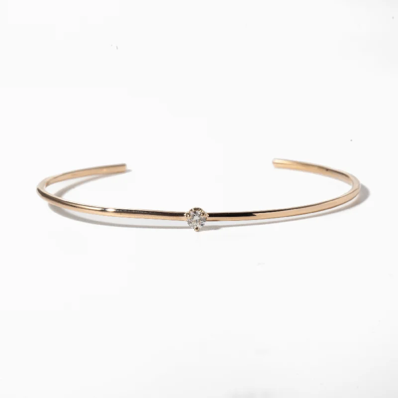 Open Cuff with a Prong Set Diamond